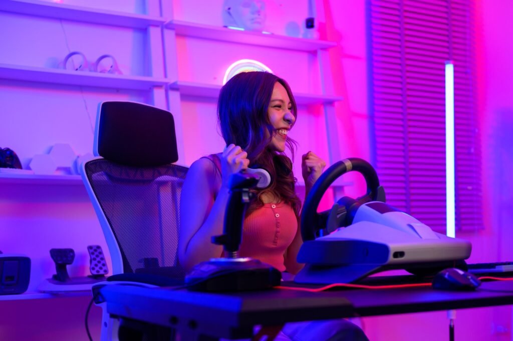 Young Asian pretty woman Pro Gamer have live streaming playing video game, Racing game at home